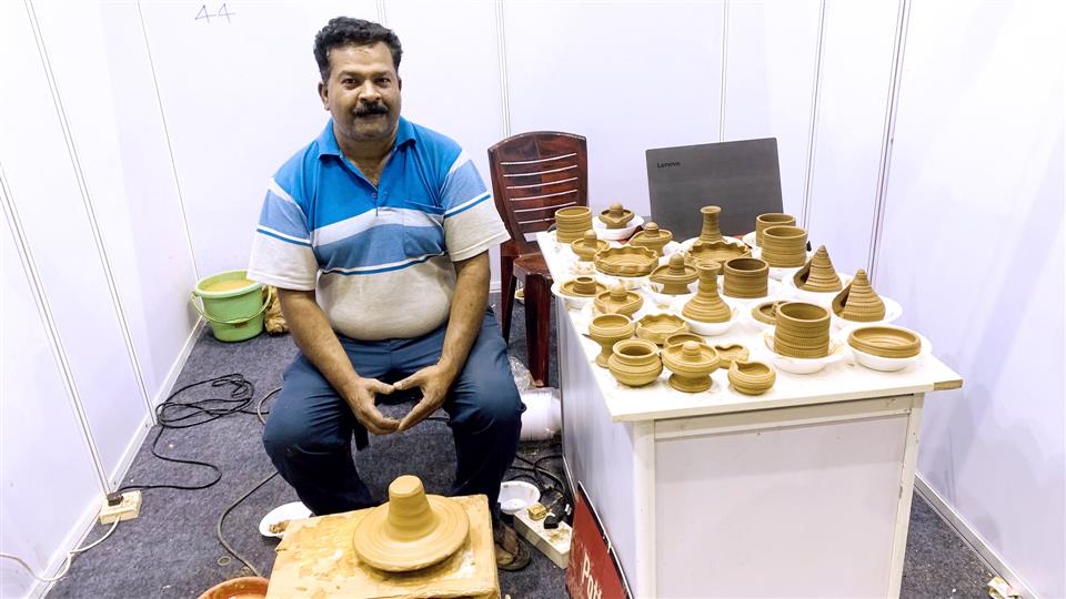N. Lokesh, who makes pottery with art's work.